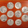 Ten Pewter Medallions Mounted on Wood Plaque, Sculpture by Joe Beeler